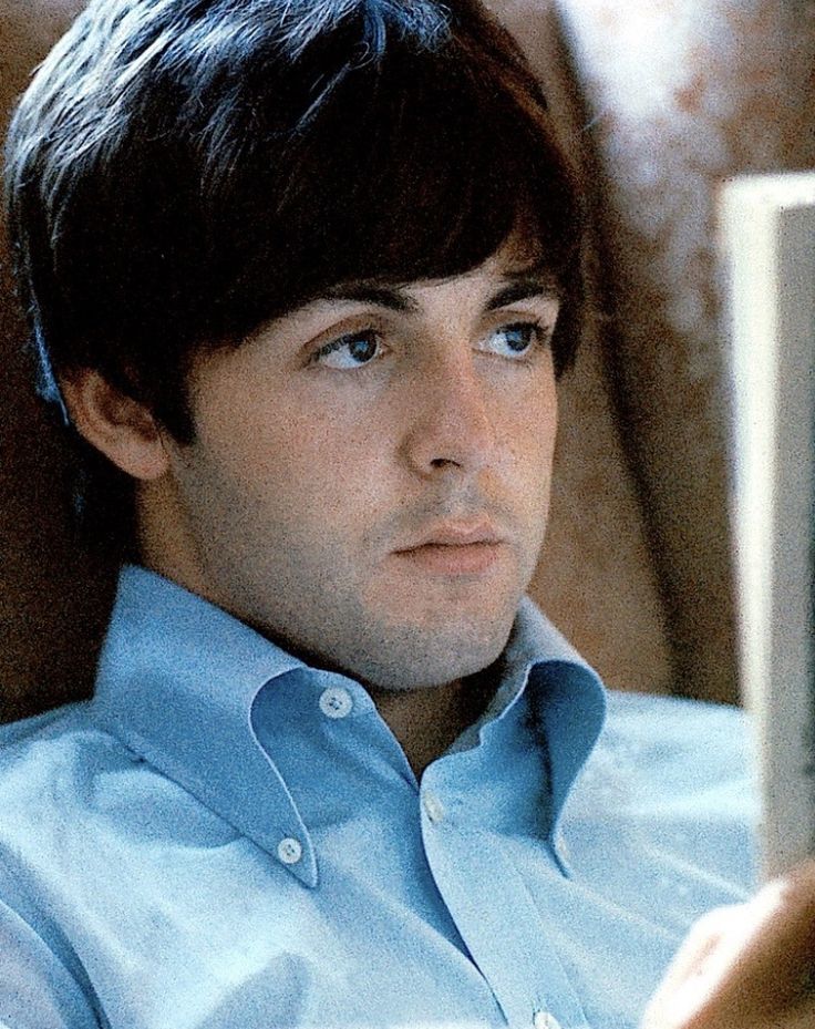 paul mccartney in a blue polo